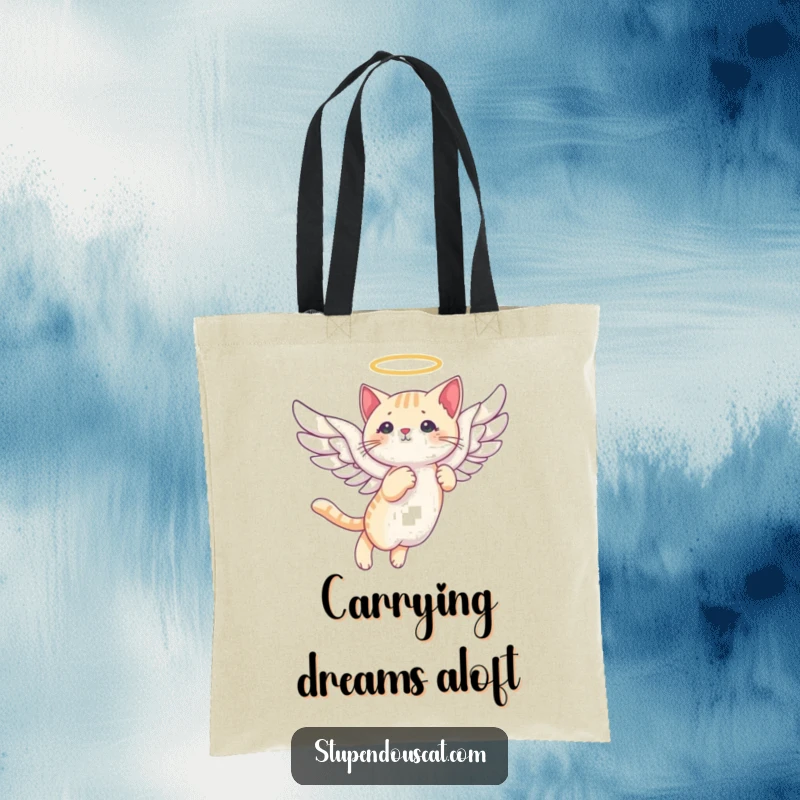 Funny angelic cat wings tote bag depicting a cat with large wings gliding through the sky, carrying dreams with grace.