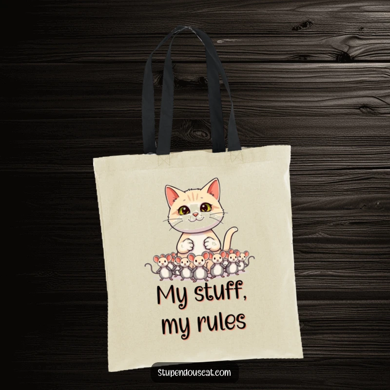 Funny cat tote bag showing a cat standing commandingly over an army of toy mice.